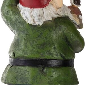 Back view of a garden gnome in a green shirt, blue pants, and red hat holding a small bird.