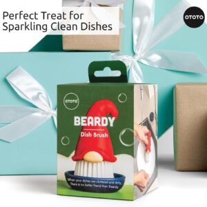 Close-up of a boxed product labeled "OTOTO Beardy Dish Brush" with a gnome design, surrounded by gift-wrapped presents with white ribbons.